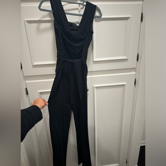 Black Flare Off the Shoulder Jumpsuit from Bailey44 on Revolve w/ Waist Sincher - Picture 2 of 3